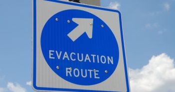 closeup of an evacuation road sign