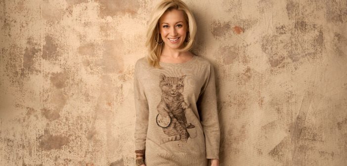 Promo photo of Kelly Pickler wearing the kitty crooner sweater