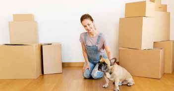 woman moving into n apartment with her dog