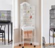 Examples of bird cages for pet birds including tabletop and standing cages.