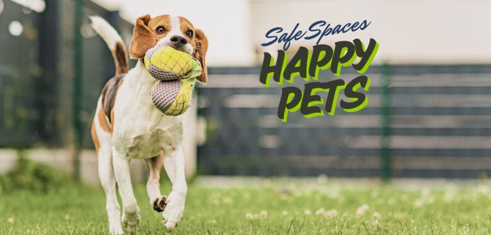 A happy Beagle dog runs across a green backyard with a secure fence in the background, holding a plush toy in its mouth. The text overlay reads "Safe Spaces, Happy Pets" in bold, playful typography.